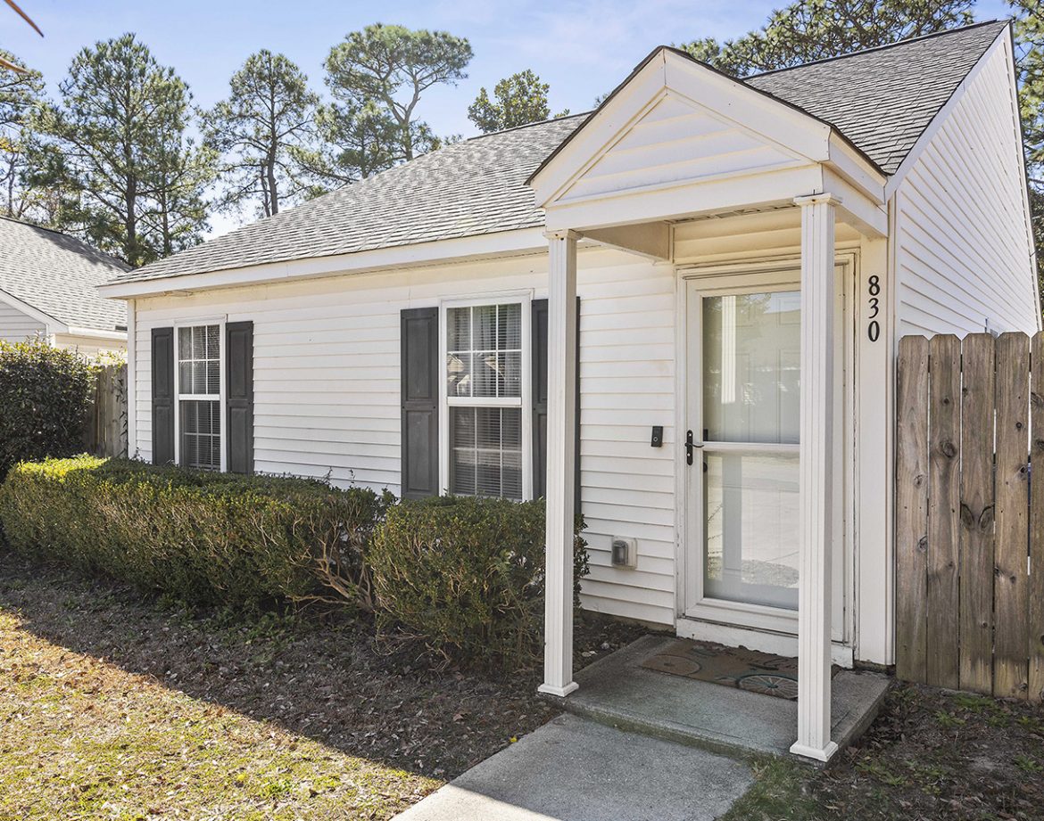 Twin beds in the second bedroom with playful decor.