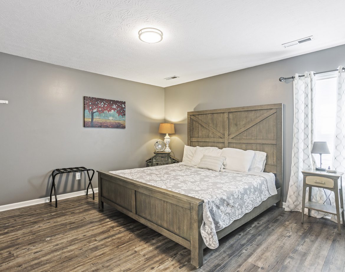 Couple relaxing on the porch with morning coffee.