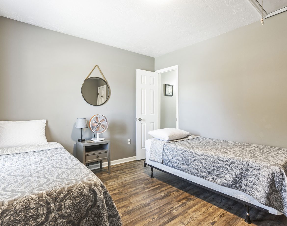 Cozy living room with beach-themed decor.