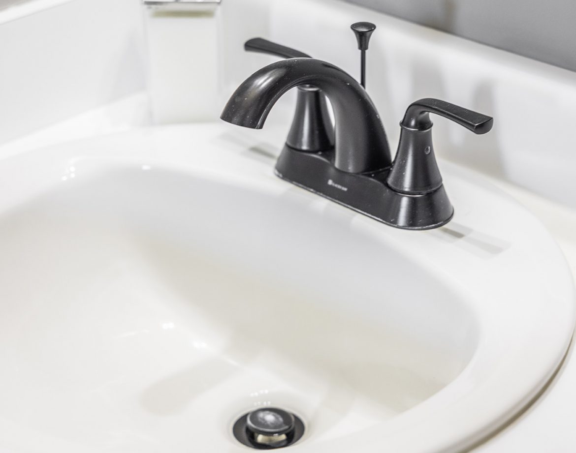 Second bedroom equipped with two twin beds.